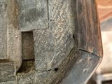 a close up of a piece of wood with a hole in it