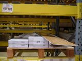 a pallet with a lot of boxes on it in a warehouse