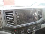 a car dashboard with a radio and dashboard controls