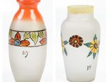 two vases with different designs on them on a white background