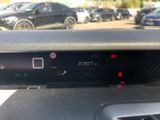 a car dashboard with a digital display on it