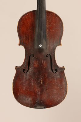 a close up of a violin on a white background
