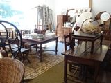 an image of a living room with a lot of furniture in it