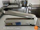 a machine that is sitting on a counter in a kitchen