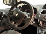 the interior of a small car with a steering wheel and dashboard