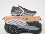 a close up of a pair of sneakers on a box