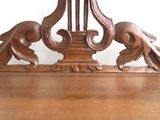 a wooden table with two birds on top of it