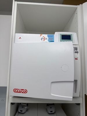 a machine that is sitting on top of a shelf