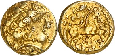 a gold coin with an image of a man on a horse