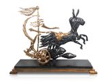 bronze sculpture of a horse pulling a cart with a man on it