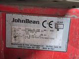 a label on the side of a machine that says john bean