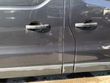 a car that has a door handle on the side of it