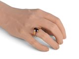 an image of a woman ' s hand with a ring on it ' s finger