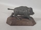 bronze figurine of a boar running on a base