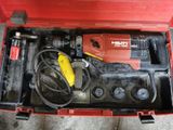 an image of a red tool box with tools in it