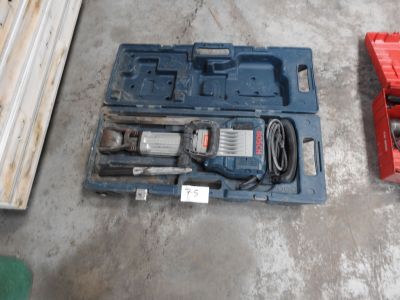 two tools that are sitting on the floor