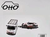 a box with a toy car and a car on it