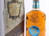 an image of a bottle of whisky next to a cardboard box