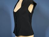a black top on a mannequin mannequin mannequin mannequin mannequin mannequin mannequin mannequin mannequin