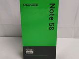 a close up of a green box on a white surface