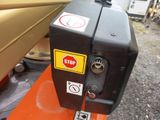a close up of a stop sign on a forklift