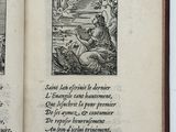 an open book with two illustrations of a man and a woman in a boat