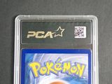 the game is in a plastic case on a black surface