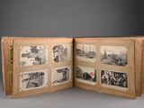 a book opened to show pictures of people and buildings