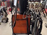 a picture of a welding machine in a garage