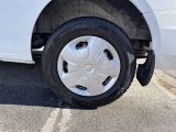a white truck that is parked in the parking lot