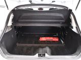 a red tool in the trunk of a car