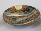 a bowl that has a marble design on it