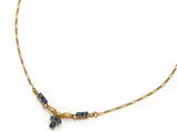 an image of a gold necklace with blue stones on a white background