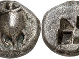 a close up of a coin with a horse on it