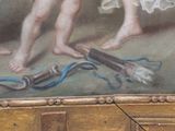 a painting on the wall of a painting of a woman with a brush