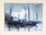 two boats that are sitting in the water