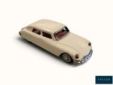 a toy car that is sitting on a white surface