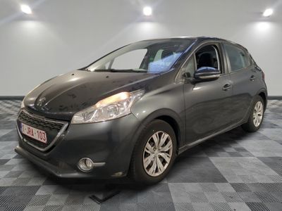a picture of a grey car parked in a garage