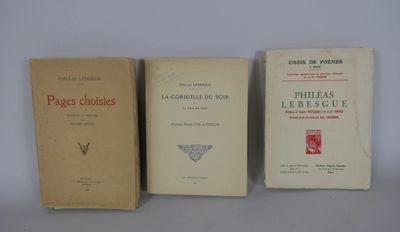 three books sitting on a table next to each other on a white surface