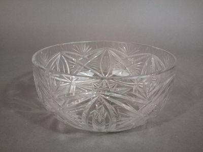 a glass bowl that is sitting on a table