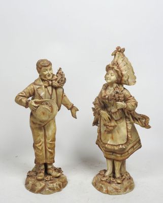 paire de figurines anciennes représentant un homme et une femme