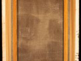 an old picture frame with a black background and a brown background