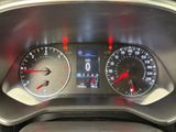 a close up of a car dashboard with various gauges