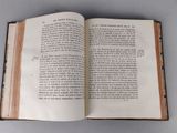an open book that is sitting on a table