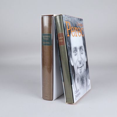two books sitting next to each other on top of a table