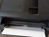 a printer that is sitting on top of a table