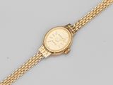 Montre Rolex pour femme à bracelet en or 18 carats
