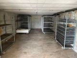 a room with a lot of racks and shelves