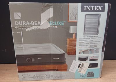 emballage d'un matelas pneumatique « Dura-Bed Deluxe » vendu en boîte