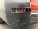 a sticker on the back of a car that says vauto